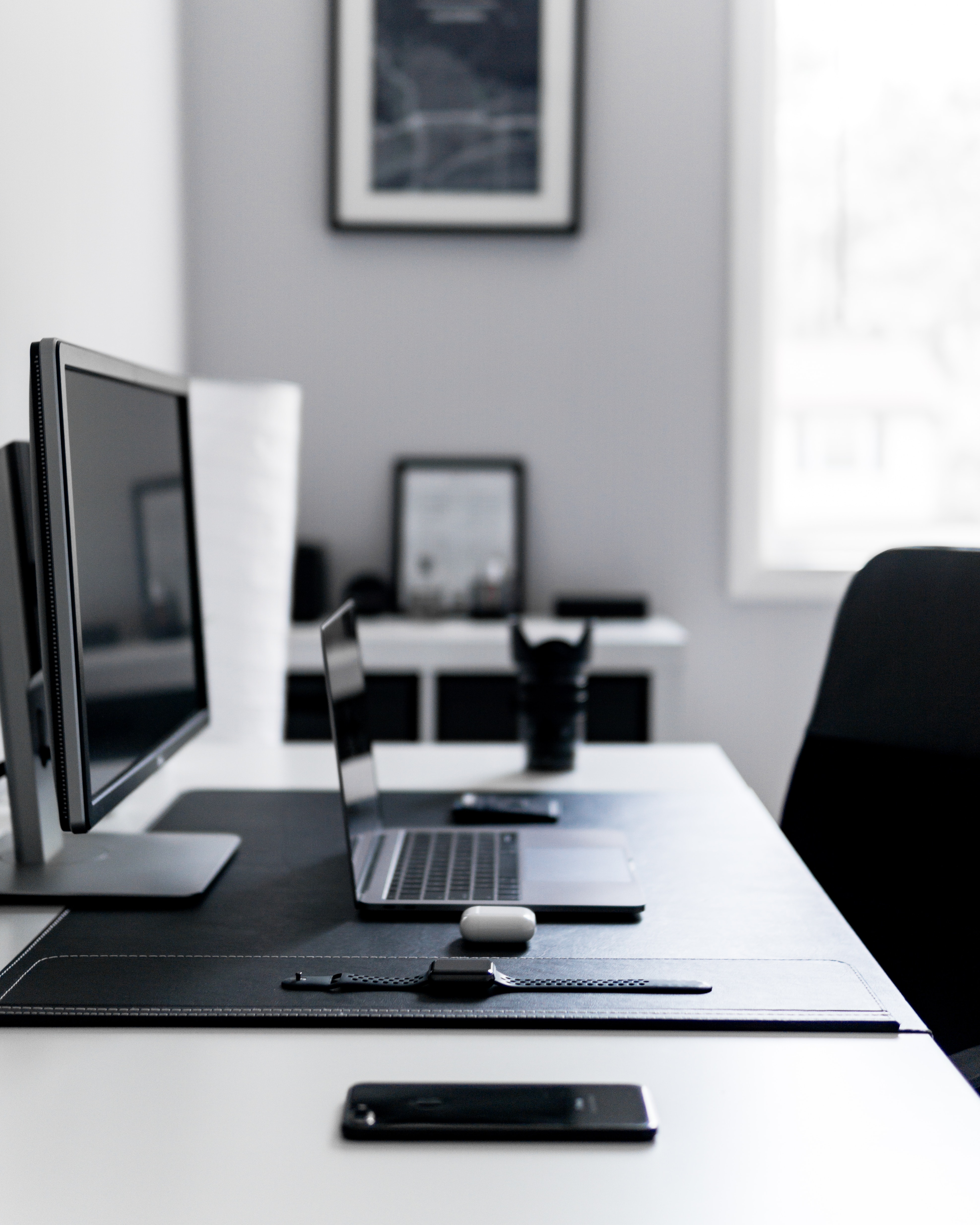 laptop and monitor on desk